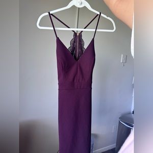 Short bodycon dress. Maroon color, size 5 but fits like a size small. Worn once.